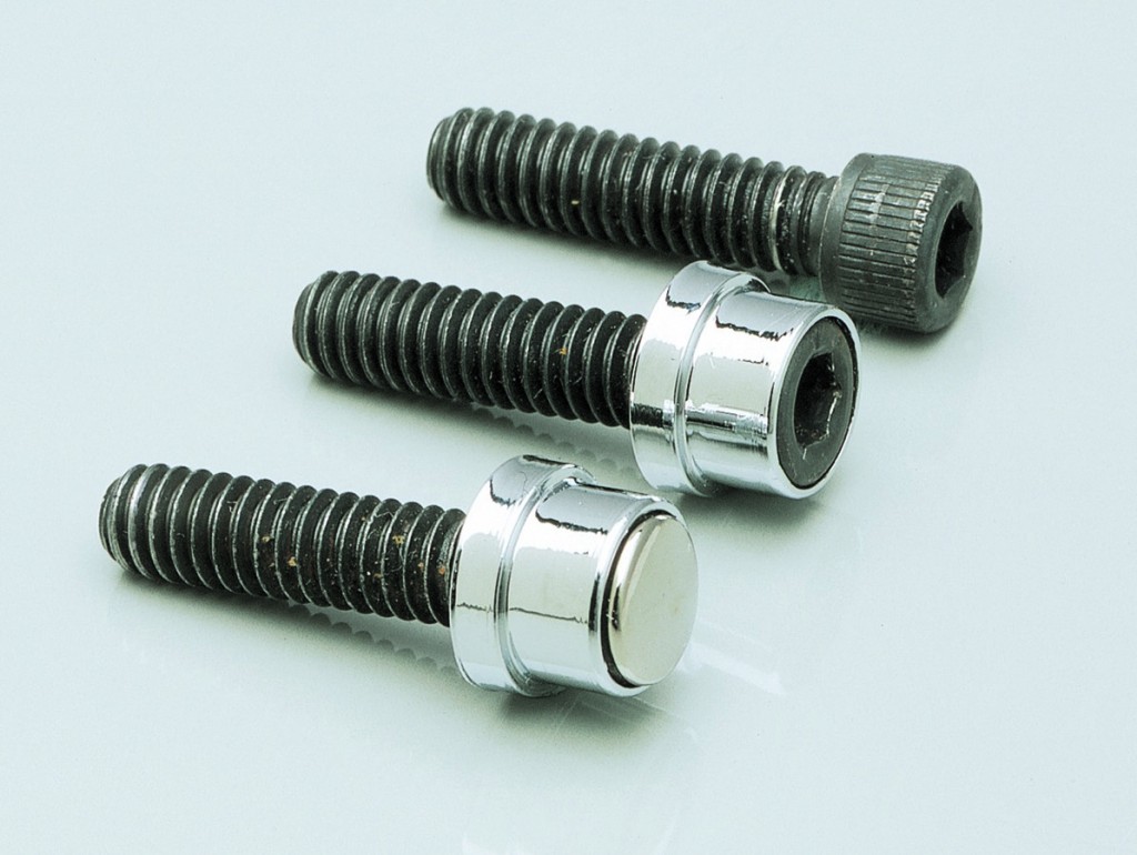 These slick little units cover the knurling on the heads of the 1/4" Allen bolts found all over your