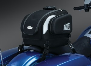 Perfect day or weekend bag, it is just the right size to store what you need! The contoured bottom and removable base pad provides perfect mounting on both passenger seats or luggage racks! Dims: 14” wide X 12” deep X 12” tall Cubic inches: 1,512 (internal main compartment) Contoured Base with removable pad provides a recessed bottom for coordinating with seats or luggage racks when needed Padded electronics pockets in multiple sizes to fit a variety of devices, including up to a 10” tall x 8-1/4” wide tablet Internal side elastic pockets and smaller mesh zippered pockets on the lid allow organization to be maintained inside the bag Contoured design provides a streamlined appearance to the back of your bike. Thermoformed side compartments with internal storage pockets Constructed with premium UV-rated, weather-resistant 1200 denier Maxtura® material Custom thermoformed construction with integrated internal support structure for durability and shape retention Premium lined interior with multiple pockets and compartments for easy organization throughout each bag Reflect-A-Light®: Strategically placed custom reflective patches for increased visibility Heavy duty metal-welded D-rings with anti-scratch plastic coating and secured with riveted, sewn box-and-cross premium attachment Protected by weatherproof zippers with glove-friendly and stylish zipper pulls Unique style to follow the contours of virtually any motorcycle and provide secure mounting Includes durable, adjustable mounting straps, ergonomically styled carrying handle, and a rain cover